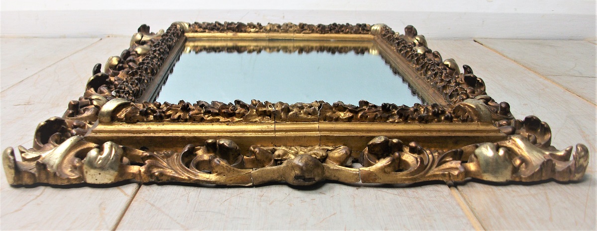 Florentine gilded carved and foliate scroll frame